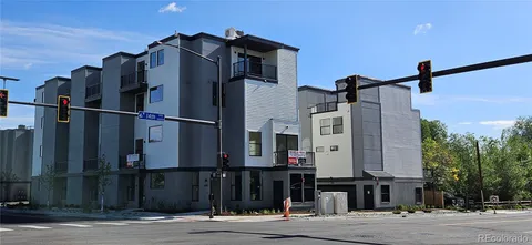 a front view of a house with a street