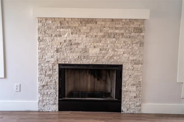 a room with a fireplace