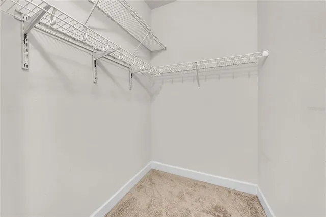 a view of a room with racks on the wall