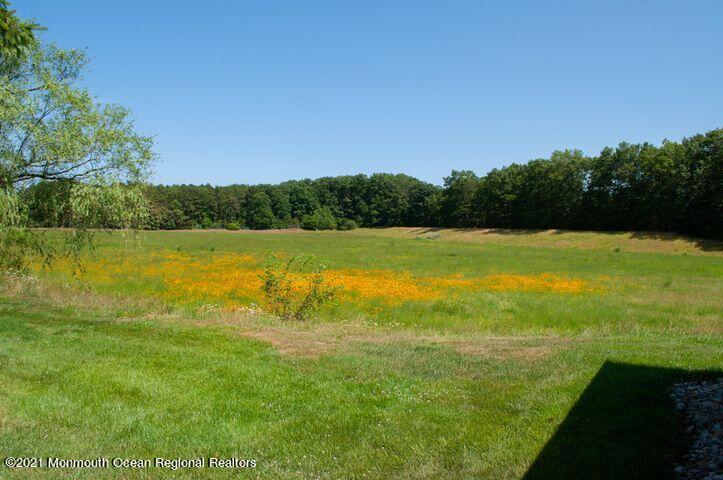 26 Symphony Avenue Bayville, NJ 08721 - Photo 34 of 40 a view of a lake with houses in the background