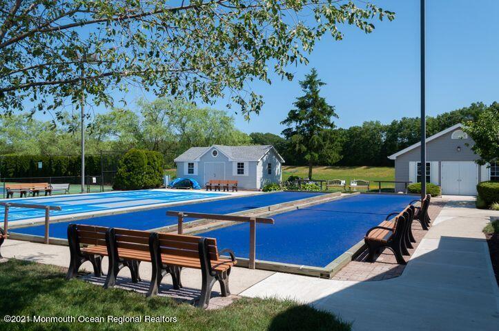 26 Symphony Avenue Bayville, NJ 08721 - Photo 37 of 40 a swimming pool with outdoor seating and yard