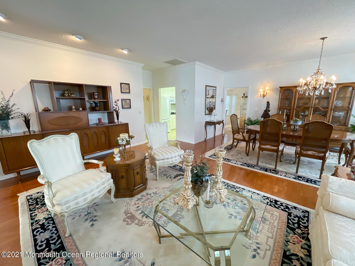 26 Symphony Avenue Bayville, NJ 08721 - Photo 10 of 40 a living room with furniture and a chandelier
