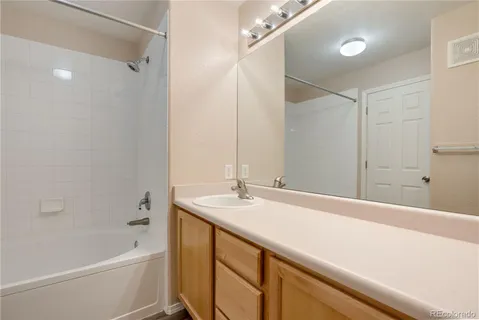 a bathroom with a sink and a bathtub