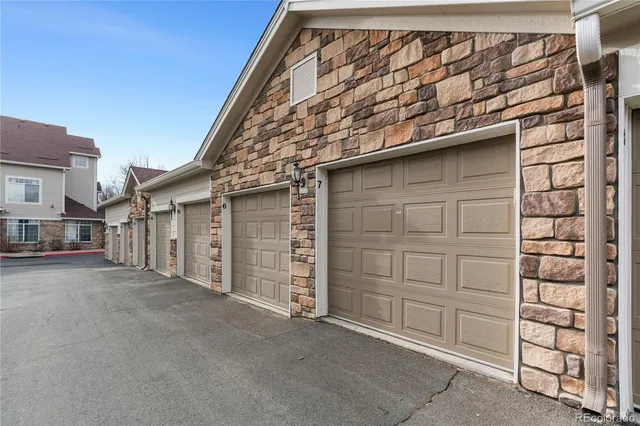 a view of a house with a garage