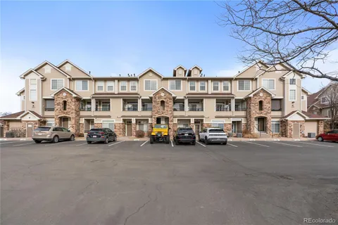 a view of a city street with tall buildings