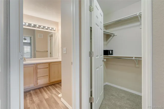 a view of walk in closet with window