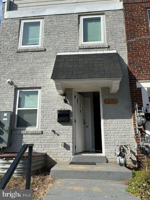 412 20th Street Northeast Washington, DC 20002 - Photo 3 of 6 a front view of a house with parking space