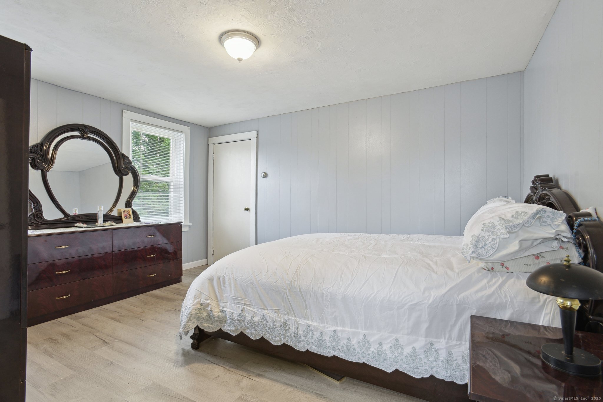 8 3rd Street Norwich, CT 06360 - Photo 17 of 39 a bedroom with a bed and a dresser