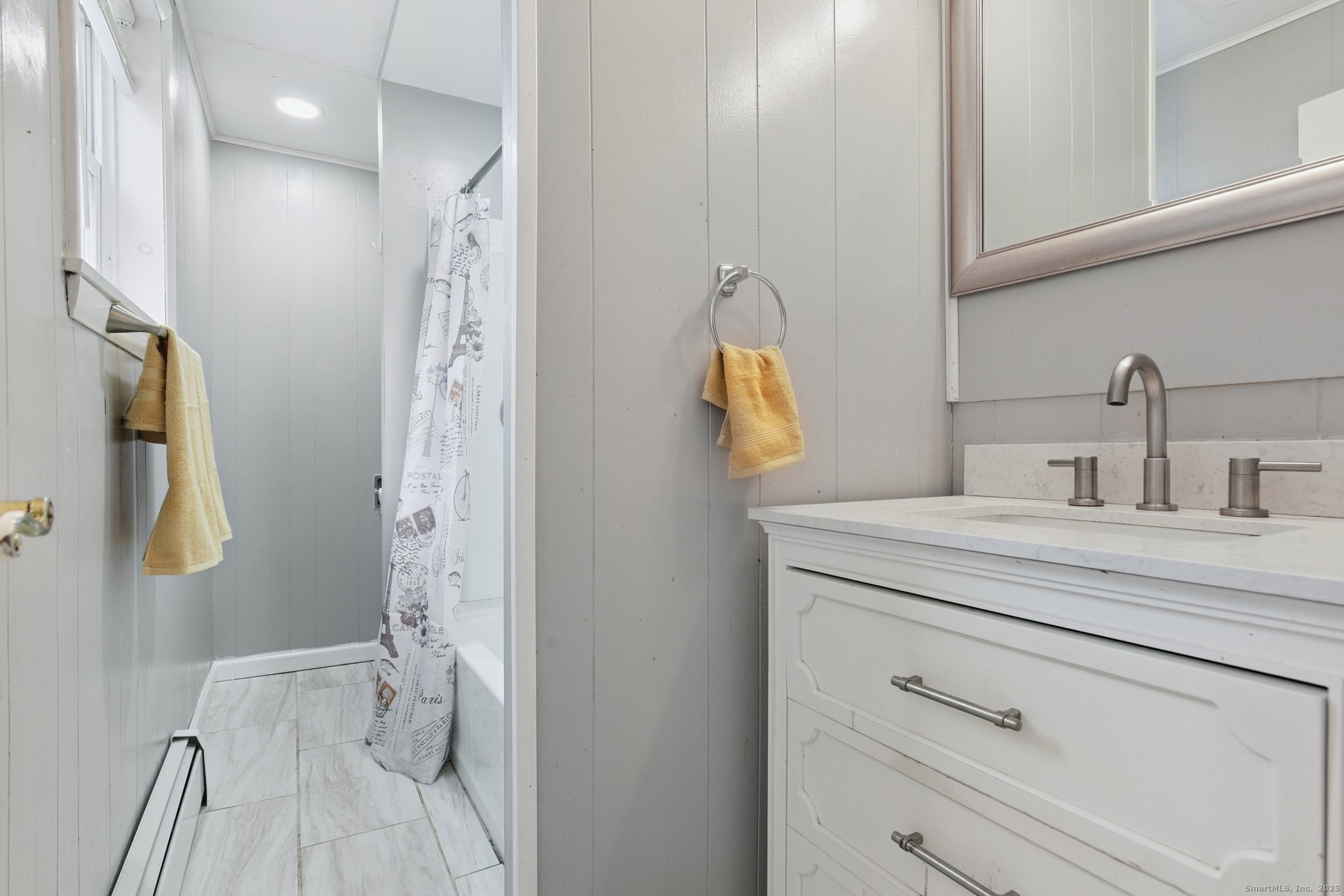 8 3rd Street Norwich, CT 06360 - Photo 28 of 39 a bathroom with a sink and mirror