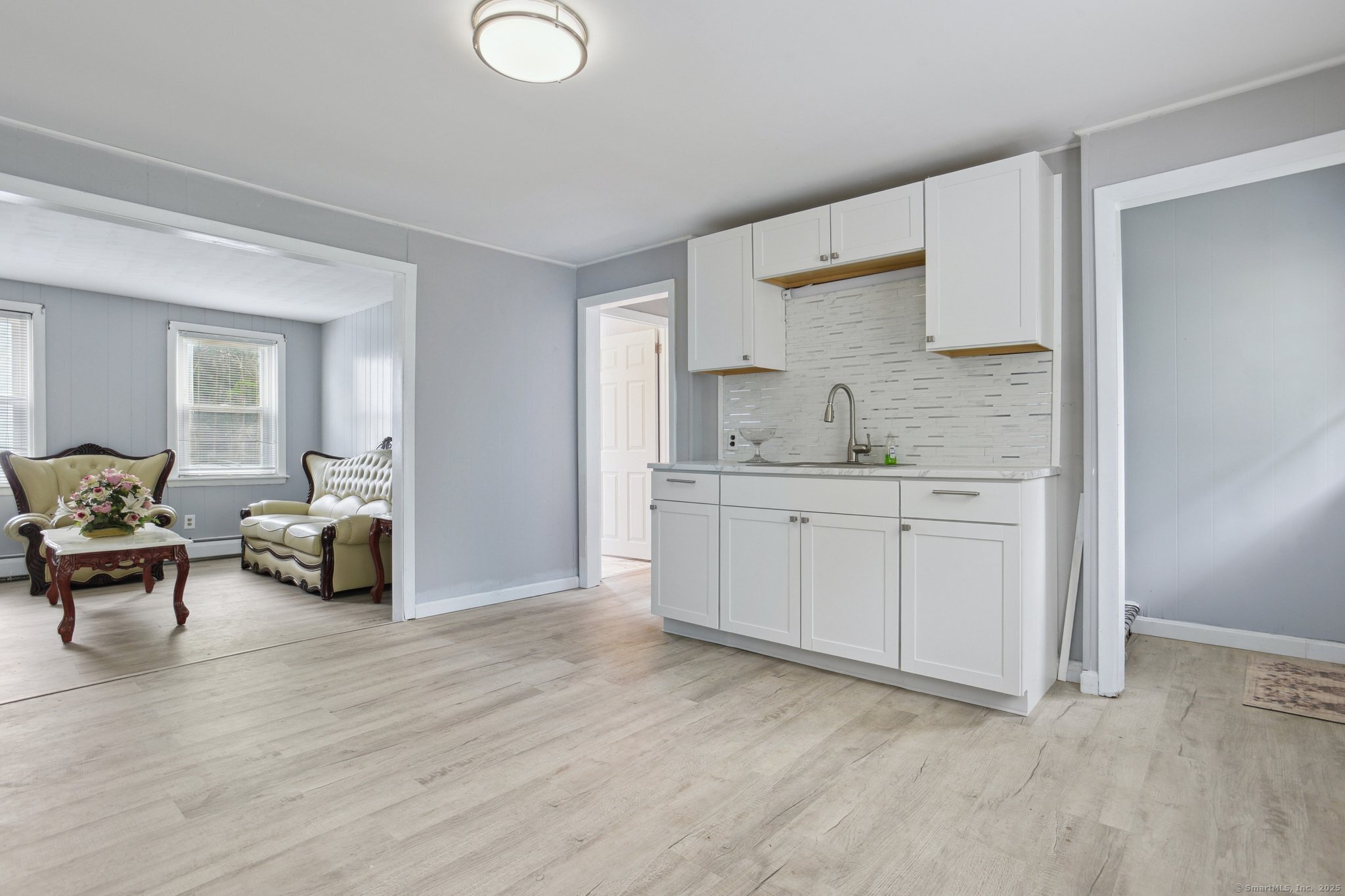 8 3rd Street Norwich, CT 06360 - Photo 6 of 39 a kitchen with sink and cabinets