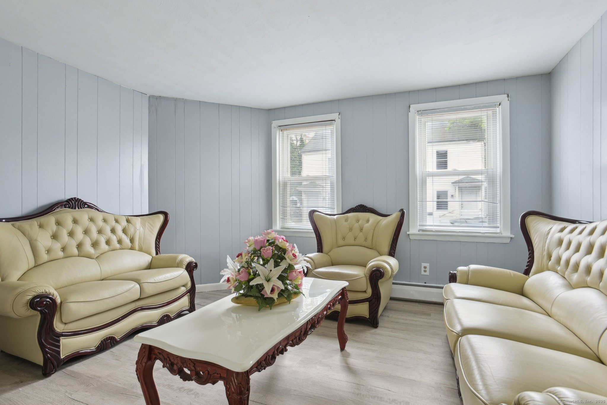 8 3rd Street Norwich, CT 06360 - Photo 9 of 39 a living room with furniture and a window