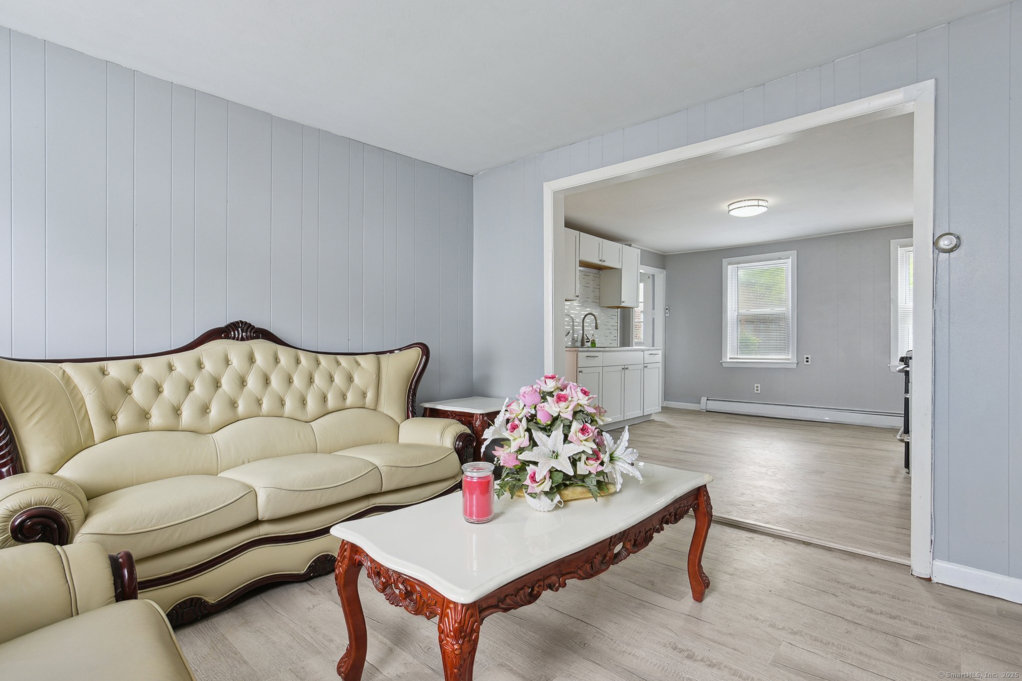 8 3rd Street Norwich, CT 06360 - Photo 10 of 39 a living room with furniture and wooden floor