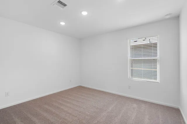 a bathroom with a granite countertop sink toilet a shower and a bathtub