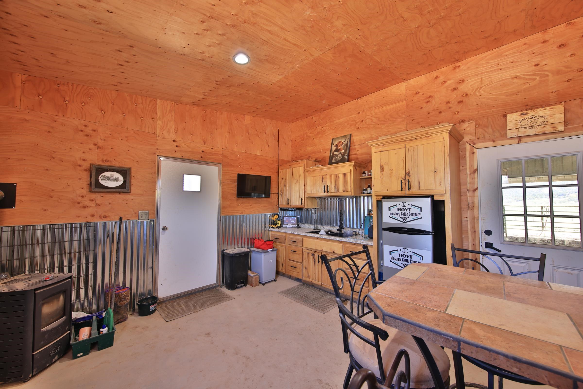 58749 Oe Road Collbran, CO 81624 - Photo 30 of 42 a dining room with furniture and window