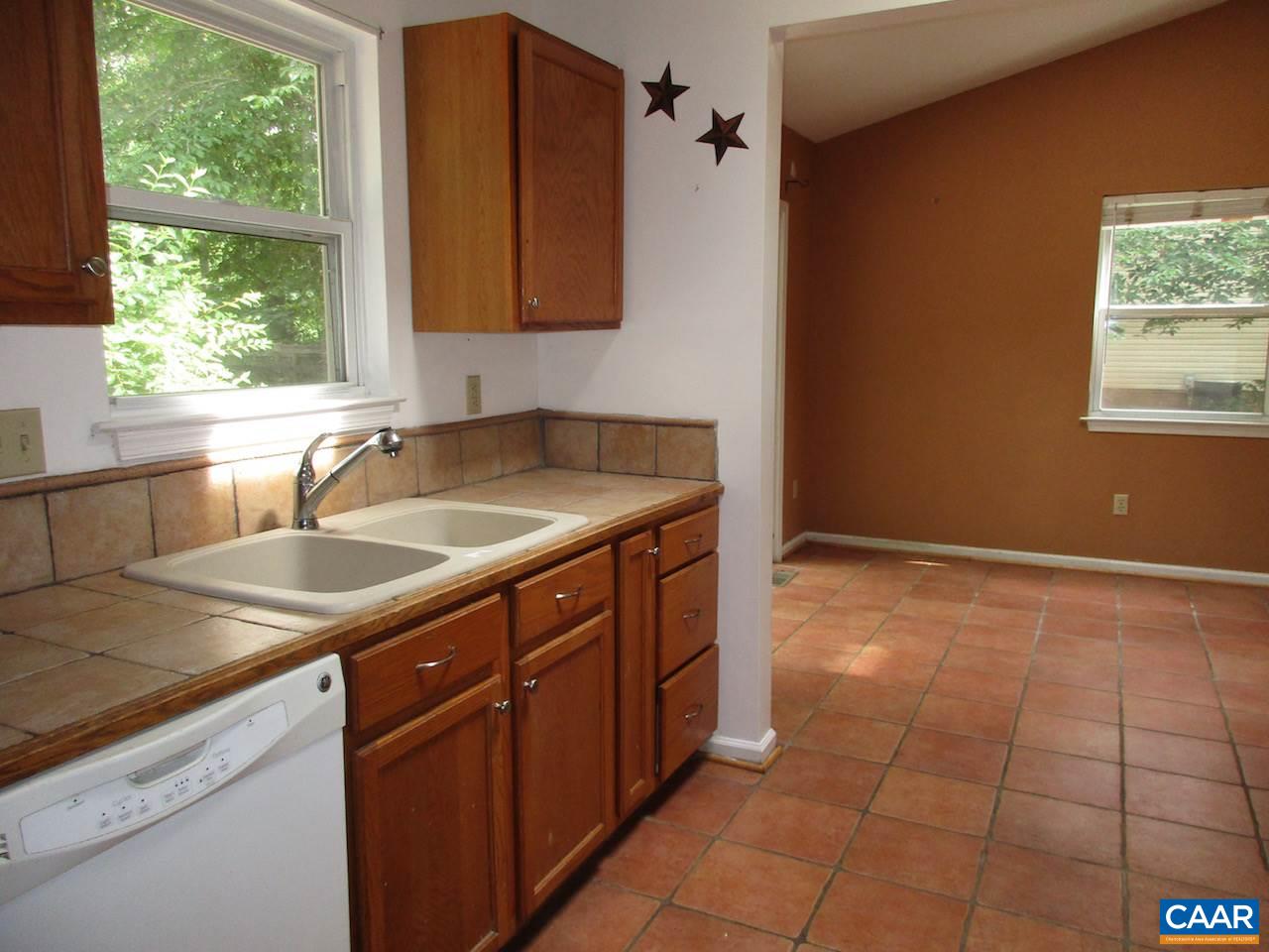 47 Riverside Drive Palmyra, VA 22963 - Photo 7 of 8 a kitchen with a sink a counter top space and cabinets