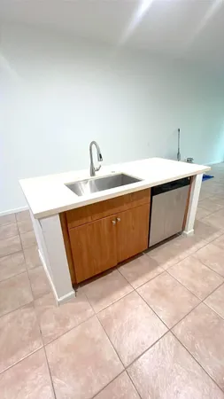 a spacious bathroom with a bathtub sink and vanity