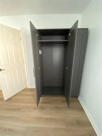 a view of entryway with wooden wall