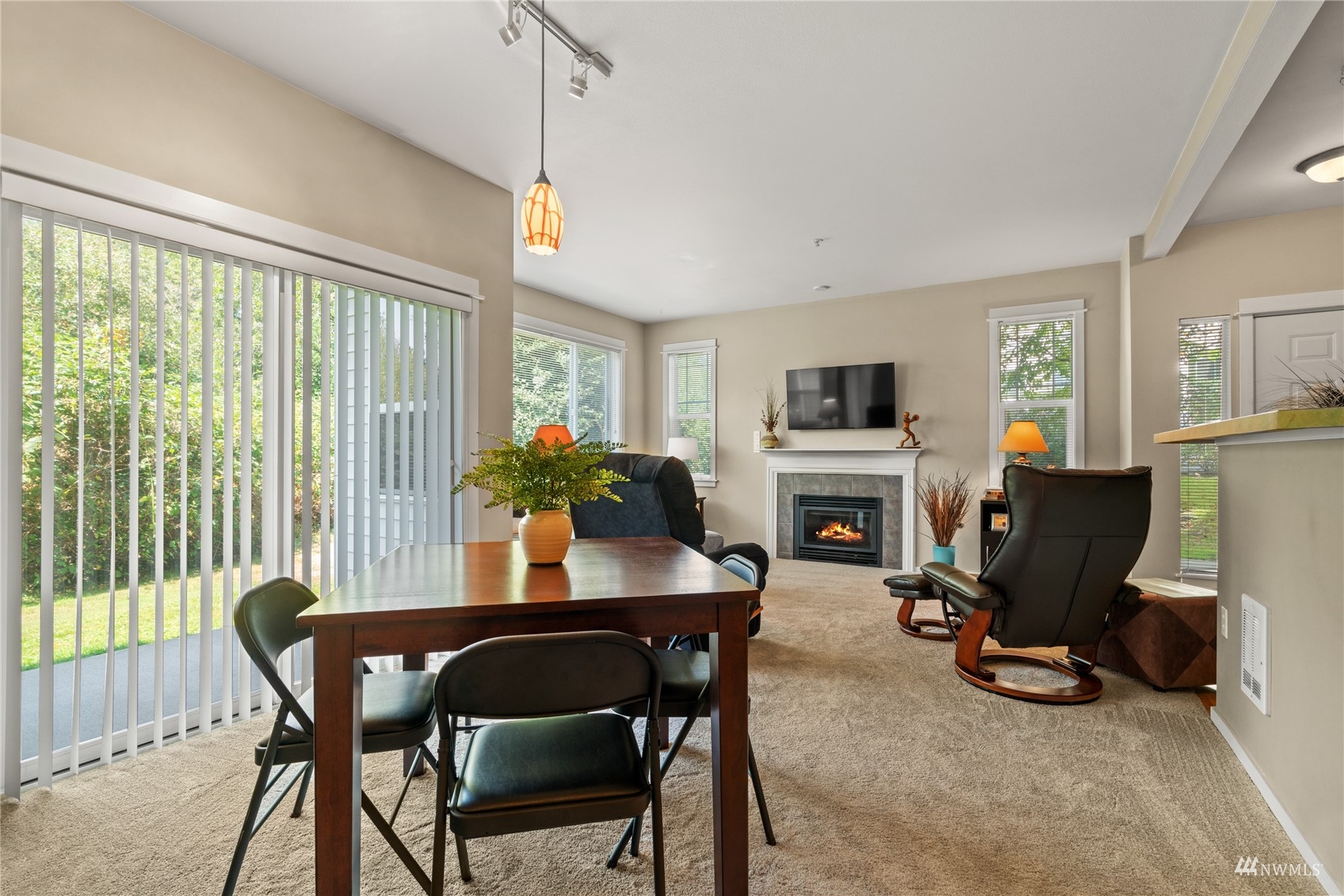 2009 196th Street Southeast, Unit C104 Bothell, WA 98012 - Photo 8 of 23 a view of a livingroom with furniture and a fireplace