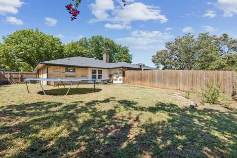 a view of pool with outdoor seating