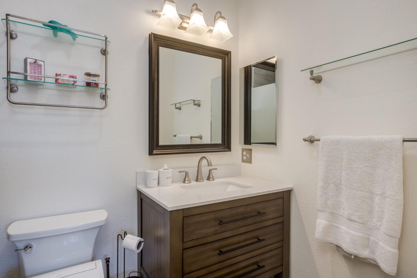 614 Arcadia Terrace, Unit 206 Sunnyvale, CA 94085 - Photo 13 of 21 a bathroom with a sink vanity and a mirror