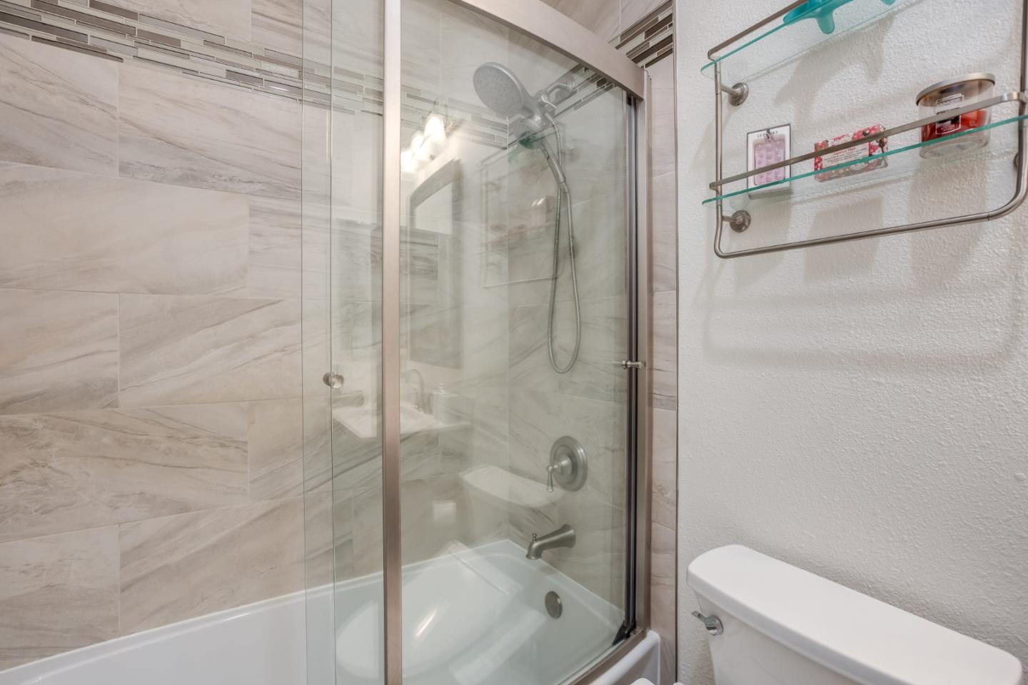 614 Arcadia Terrace, Unit 206 Sunnyvale, CA 94085 - Photo 14 of 21 a bathroom with a shower and a toilet