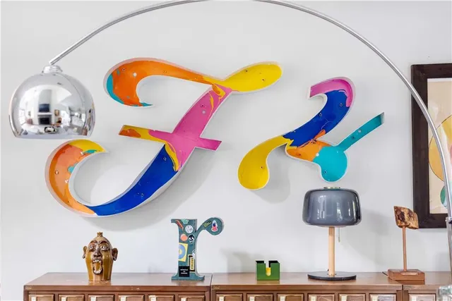 a view of a bathroom with a sink and a mirror