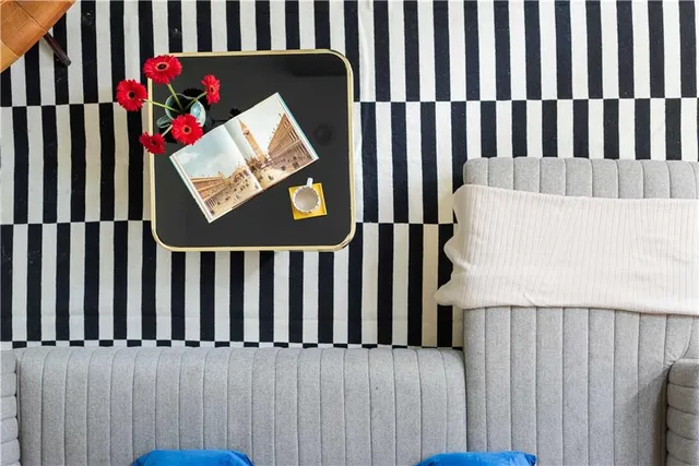 a view of a bench in wooden floor