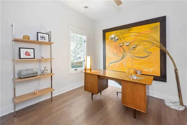 a room with window and wooden floor