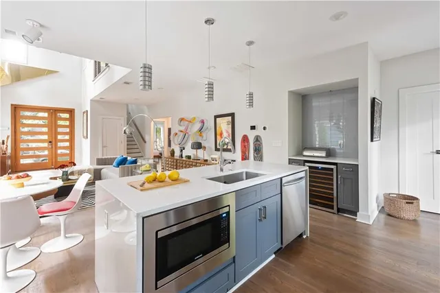 a kitchen with a stove and a sink