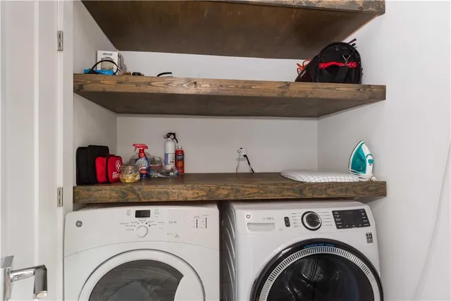 a utility room with dryer and washer