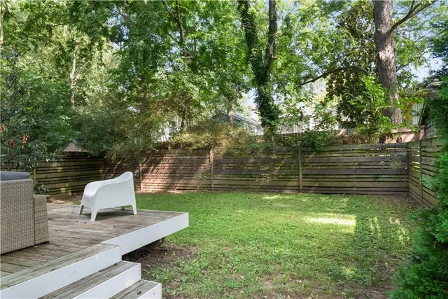 a garden view with a sitting space