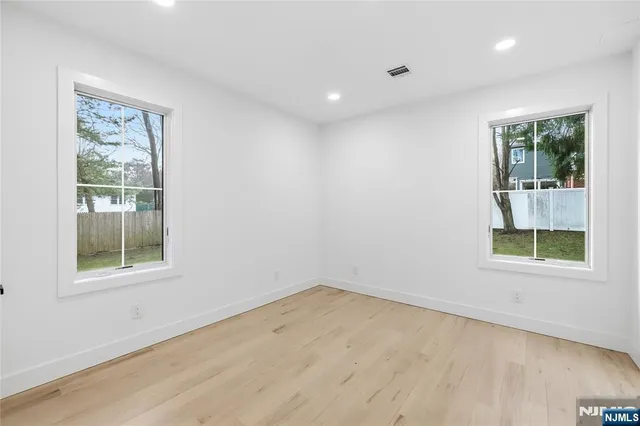 a view of a bathroom with a shower and a toilet