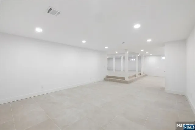 a view of a park with large trees