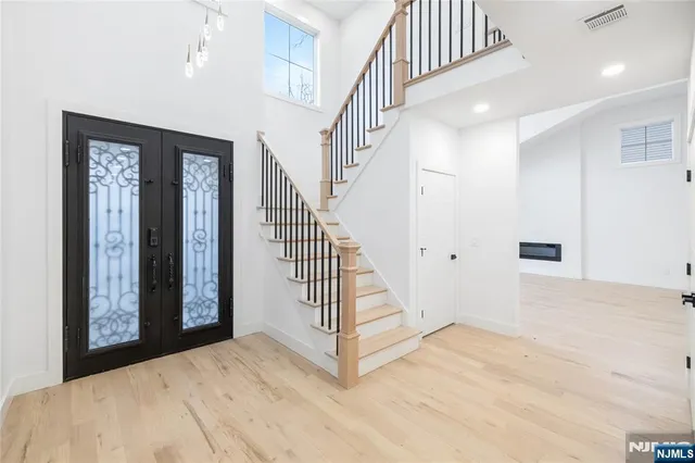 a view of a hallway with staircase