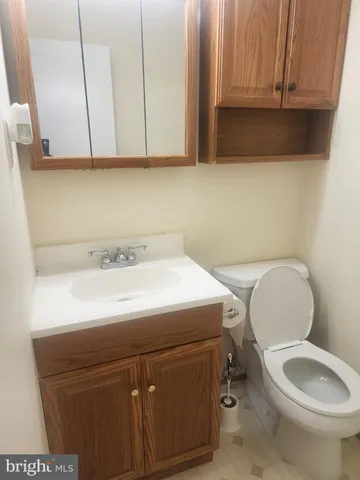 a bathroom with a shower and a toilet