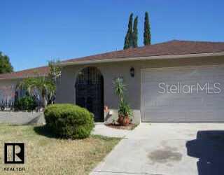 9026 Chantilly Lane Port Richey, FL 34668 - Photo 1 of 1 Exterior Front - Great curb appeal!