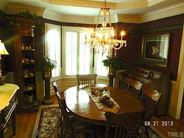5205 Deergrass Court Raleigh, NC 27613 - Photo 9 of 25 Plenty of room for your guests and serving pieces in this lovely Dining Room. Dining Room