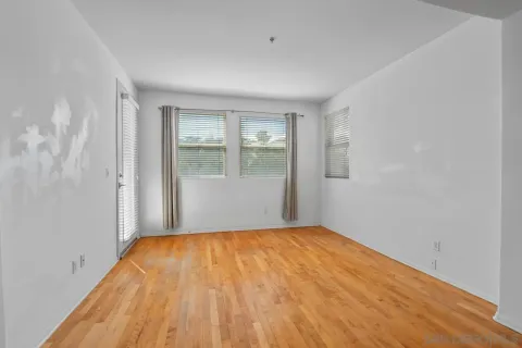 a view of an empty room and window