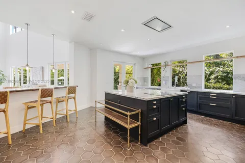 a bedroom with a bed and a lamp