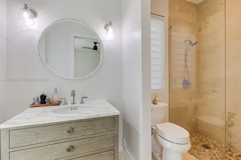 a view of a hallway with a white walls