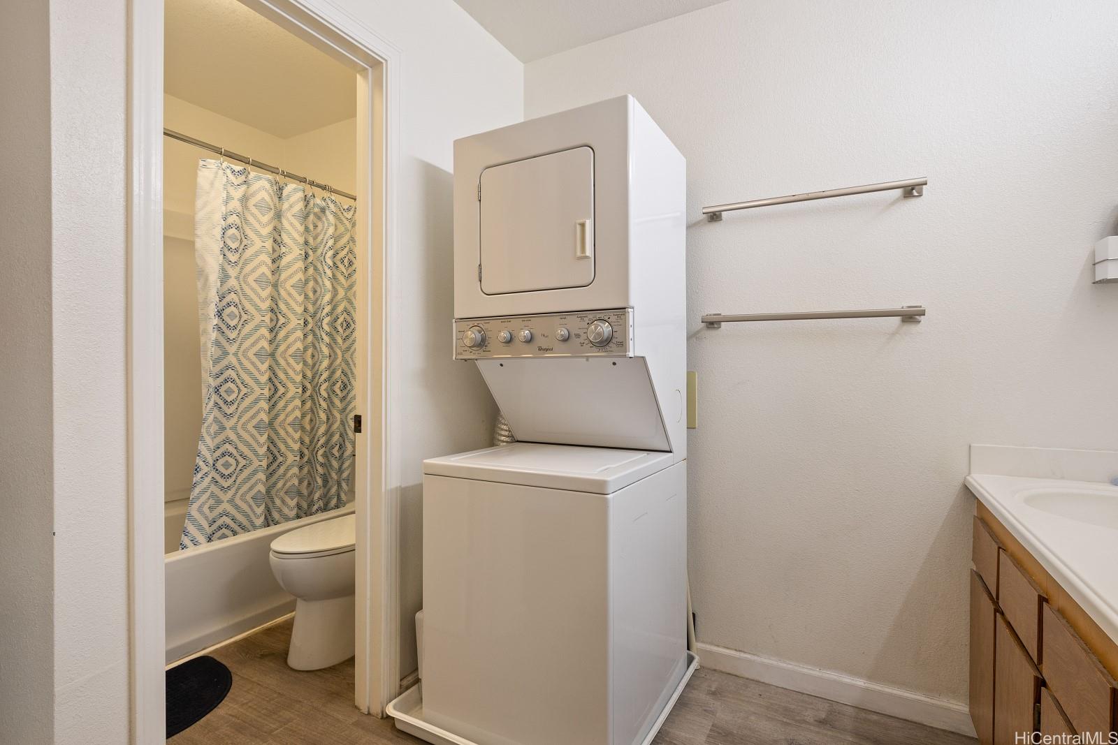 98-660 Moanalua Loop, Unit 276 Aiea, HI 96701 - Photo 13 of 25 a utility room with dryer and washer