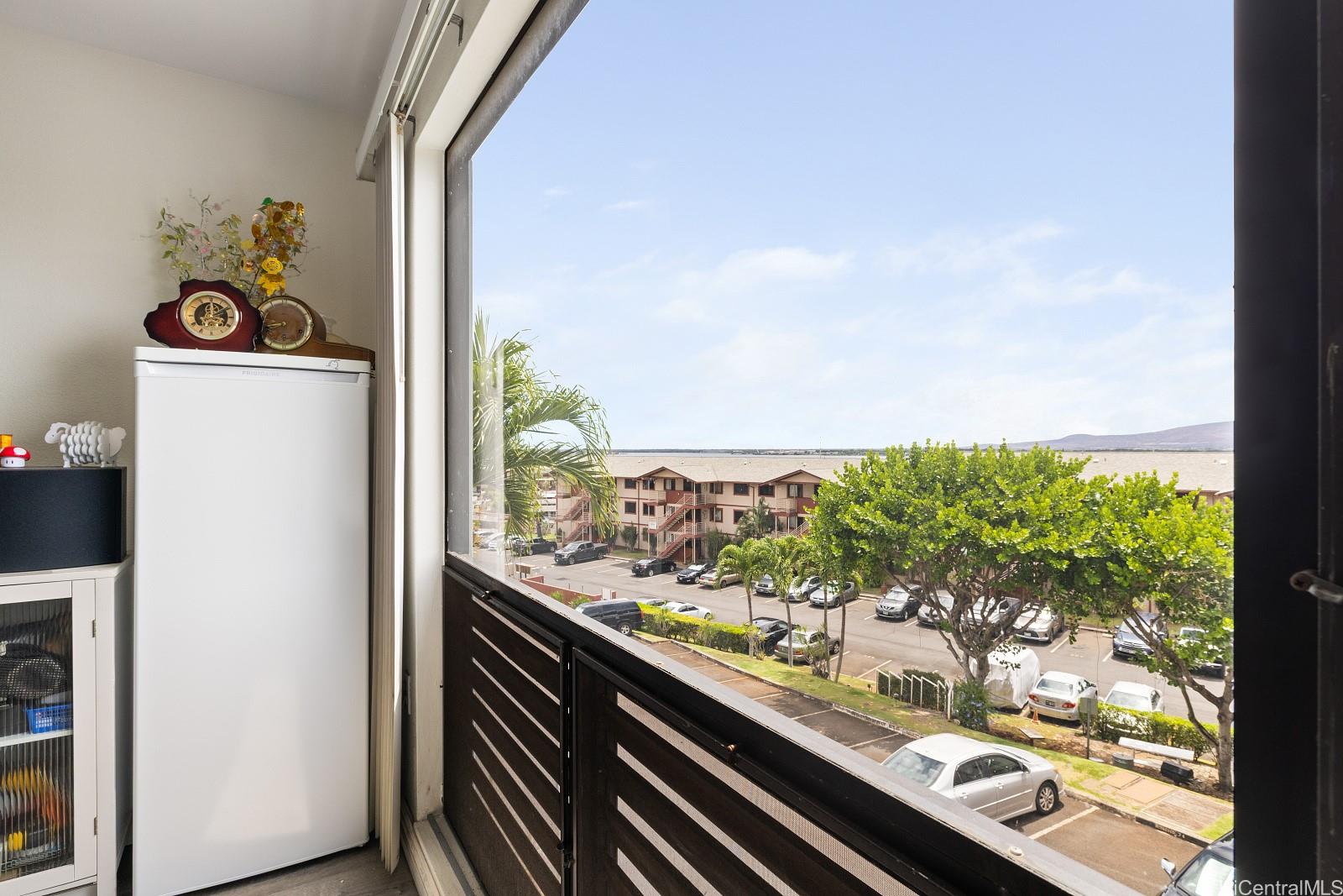 98-660 Moanalua Loop, Unit 276 Aiea, HI 96701 - Photo 6 of 25 a view of a city from a balcony