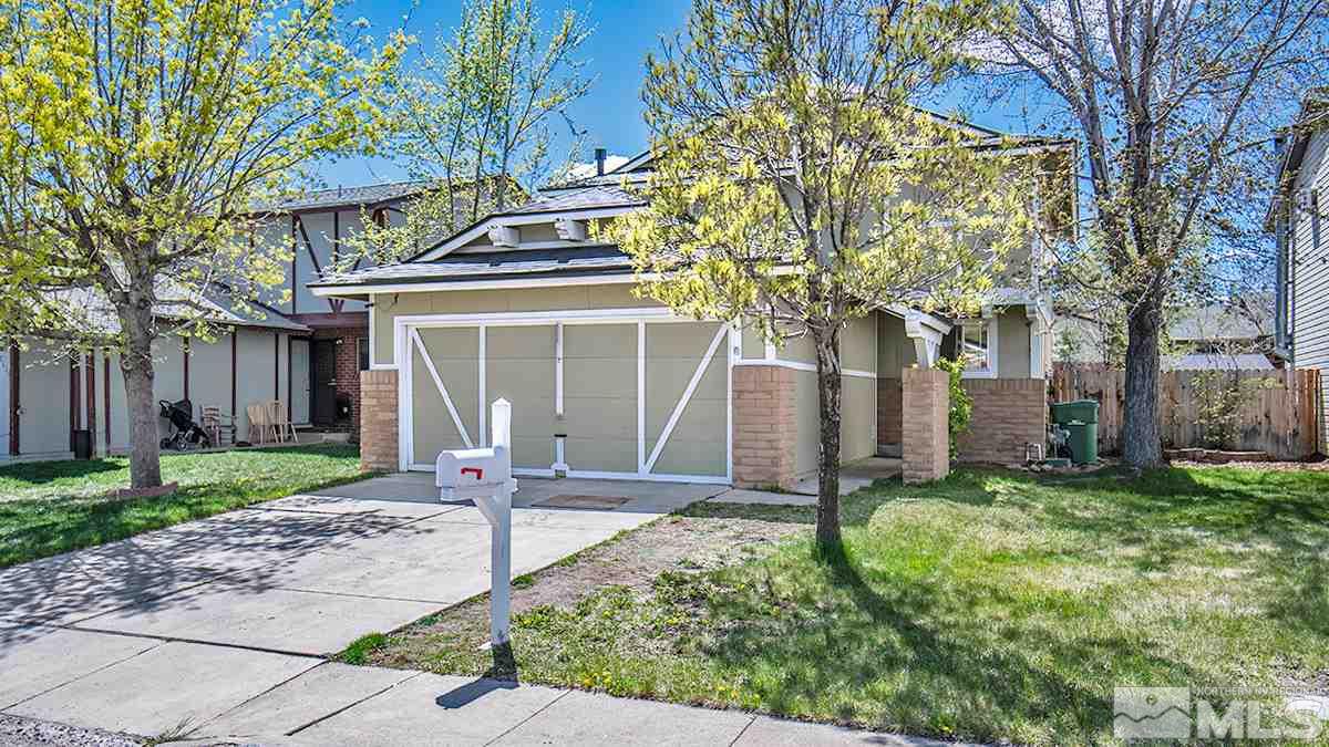 2642 Rayma Court Reno, NV 89503 - Photo 1 of 22 a front view of a house with garden
