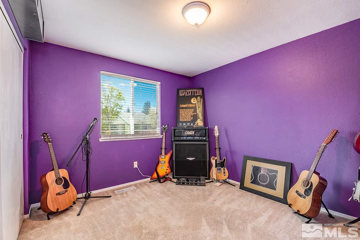 2642 Rayma Court Reno, NV 89503 - Photo 13 of 22 a bedroom with a bed and a window