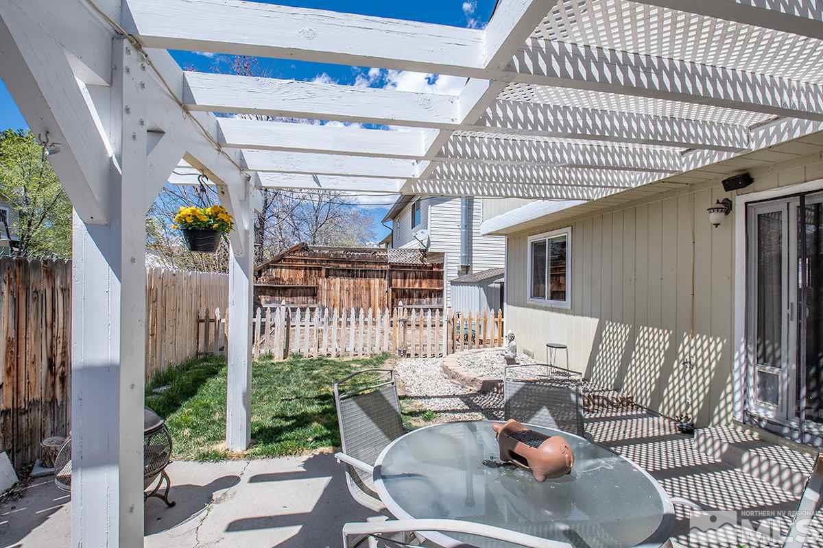 2642 Rayma Court Reno, NV 89503 - Photo 19 of 22 a view of a patio with couches table and chairs and potted plants