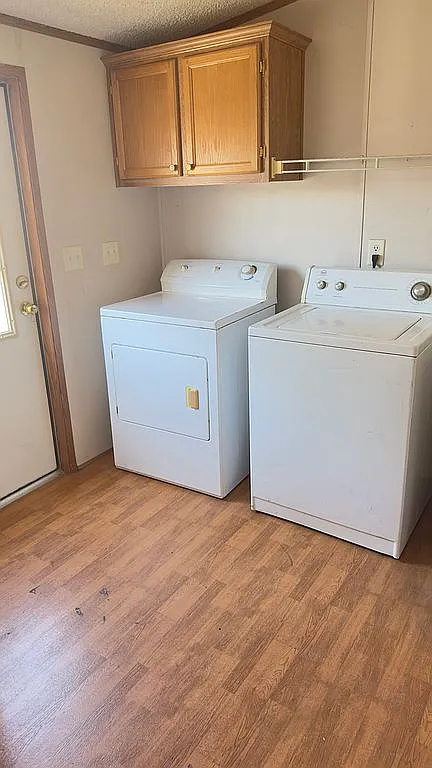 2607 George Street Round Rock, TX 78681 - Photo 8 of 14 a utility room with dryer and washer