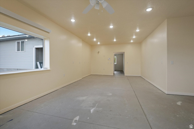 165 Main Street Georgetown, ID 83239 - Photo 27 of 50 Empty room with recessed lighting, concrete flooring, and a ceiling fan