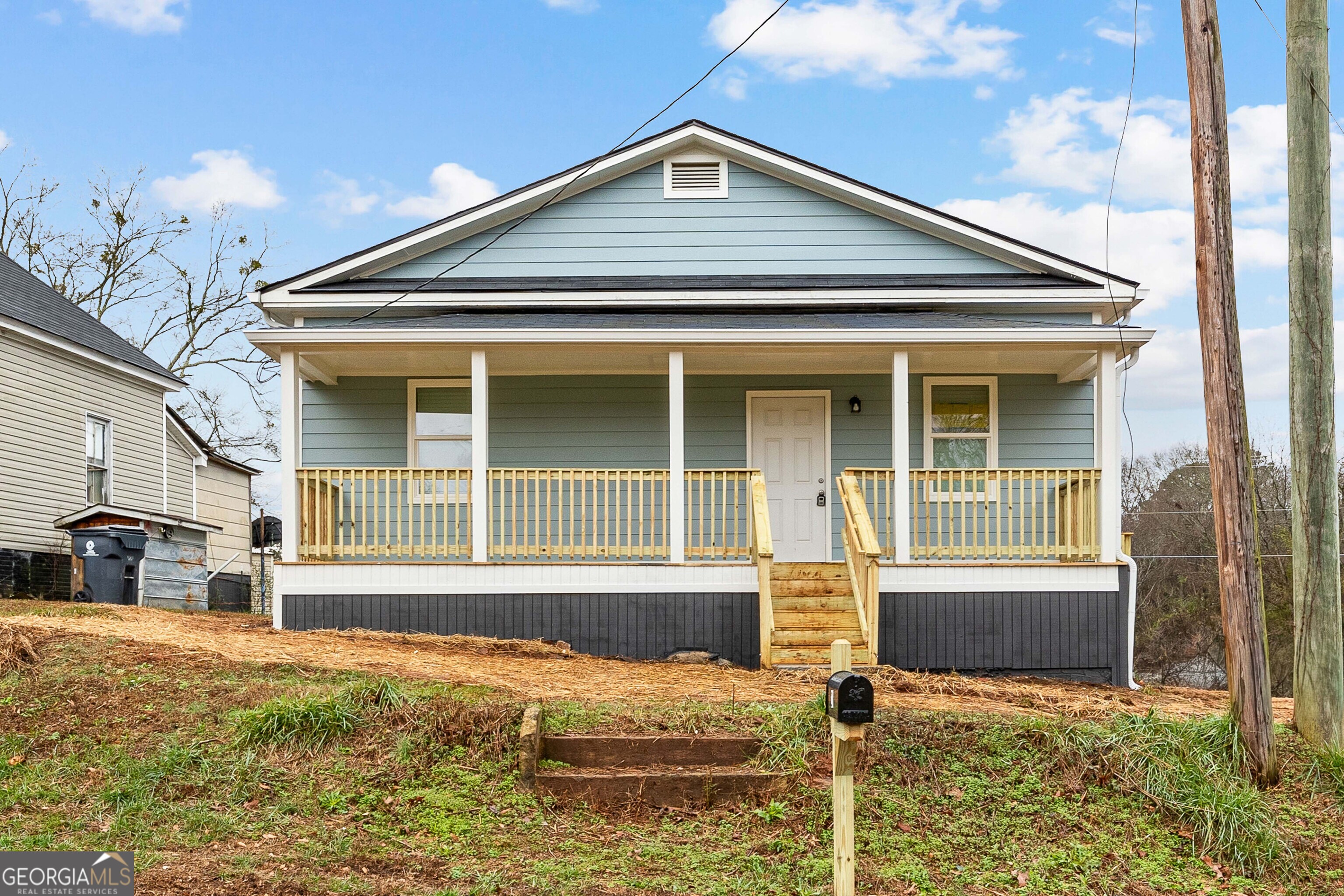 21 Shepard Street Grantville, GA 30220 - Photo 1 of 29 a front view of a house with garden