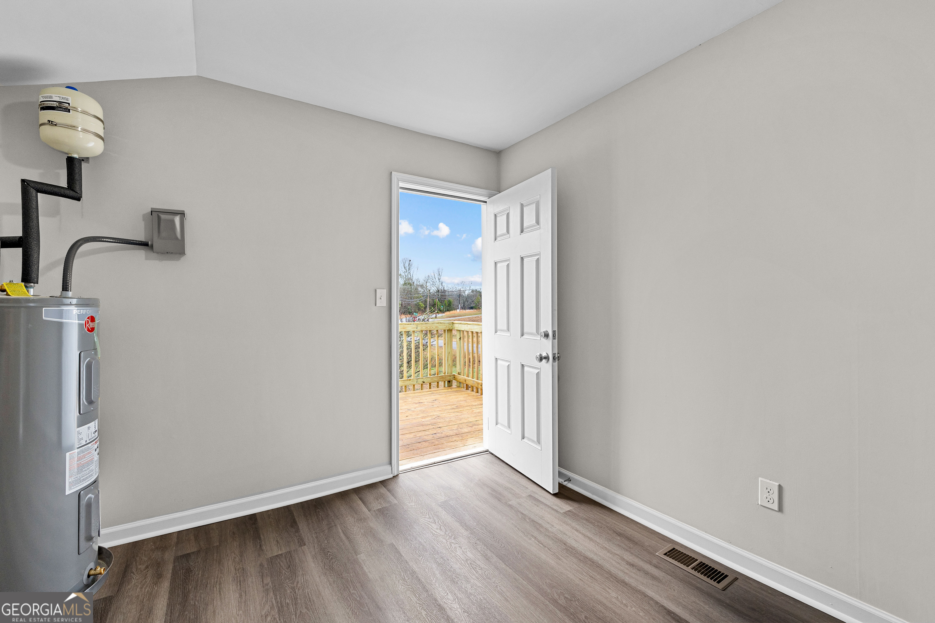 21 Shepard Street Grantville, GA 30220 - Photo 24 of 29 a view of empty room with wooden floor