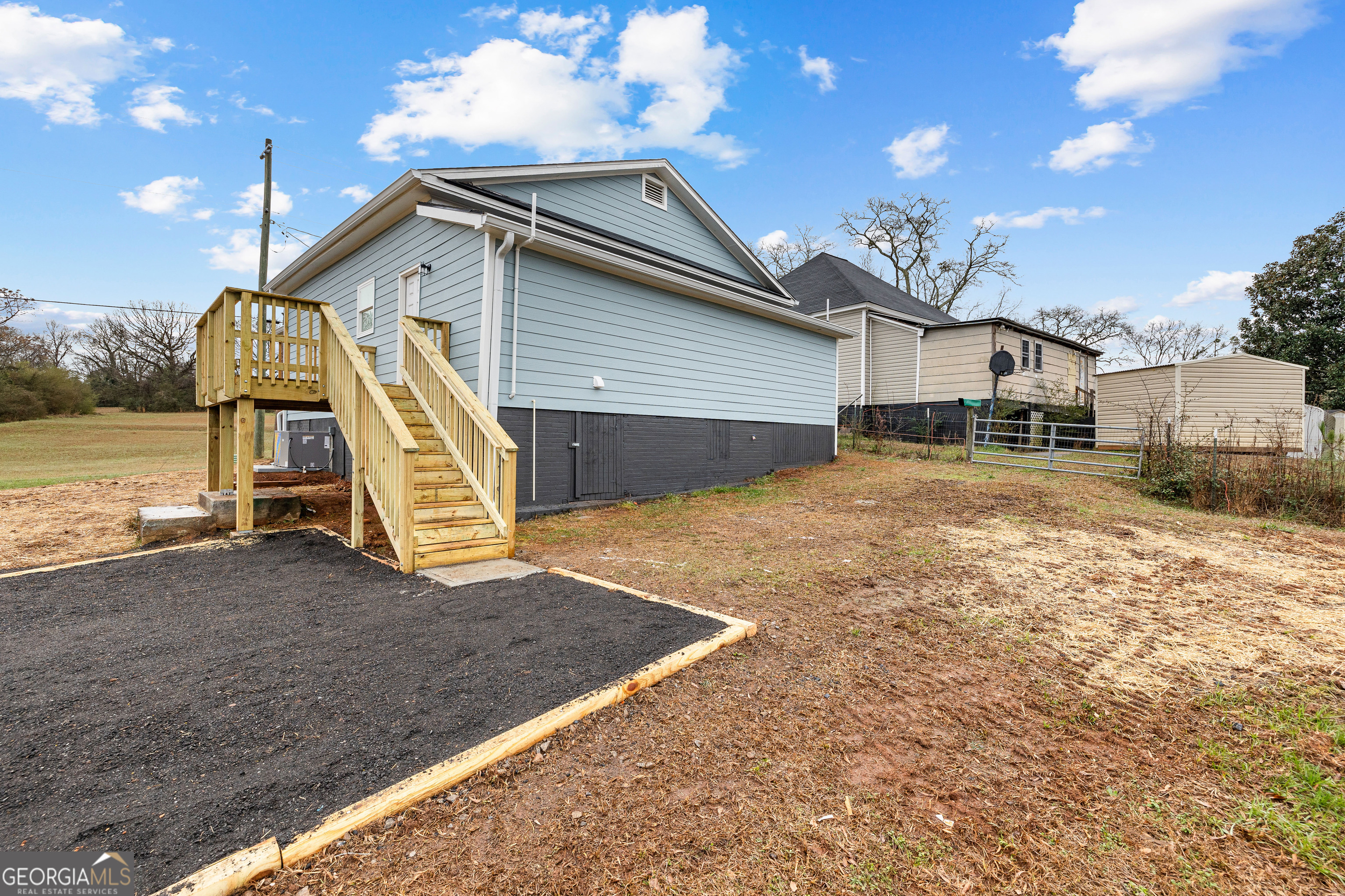 21 Shepard Street Grantville, GA 30220 - Photo 27 of 29 a view of a house with a snow in the background